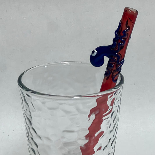 Blue octopus on red smoothie straw